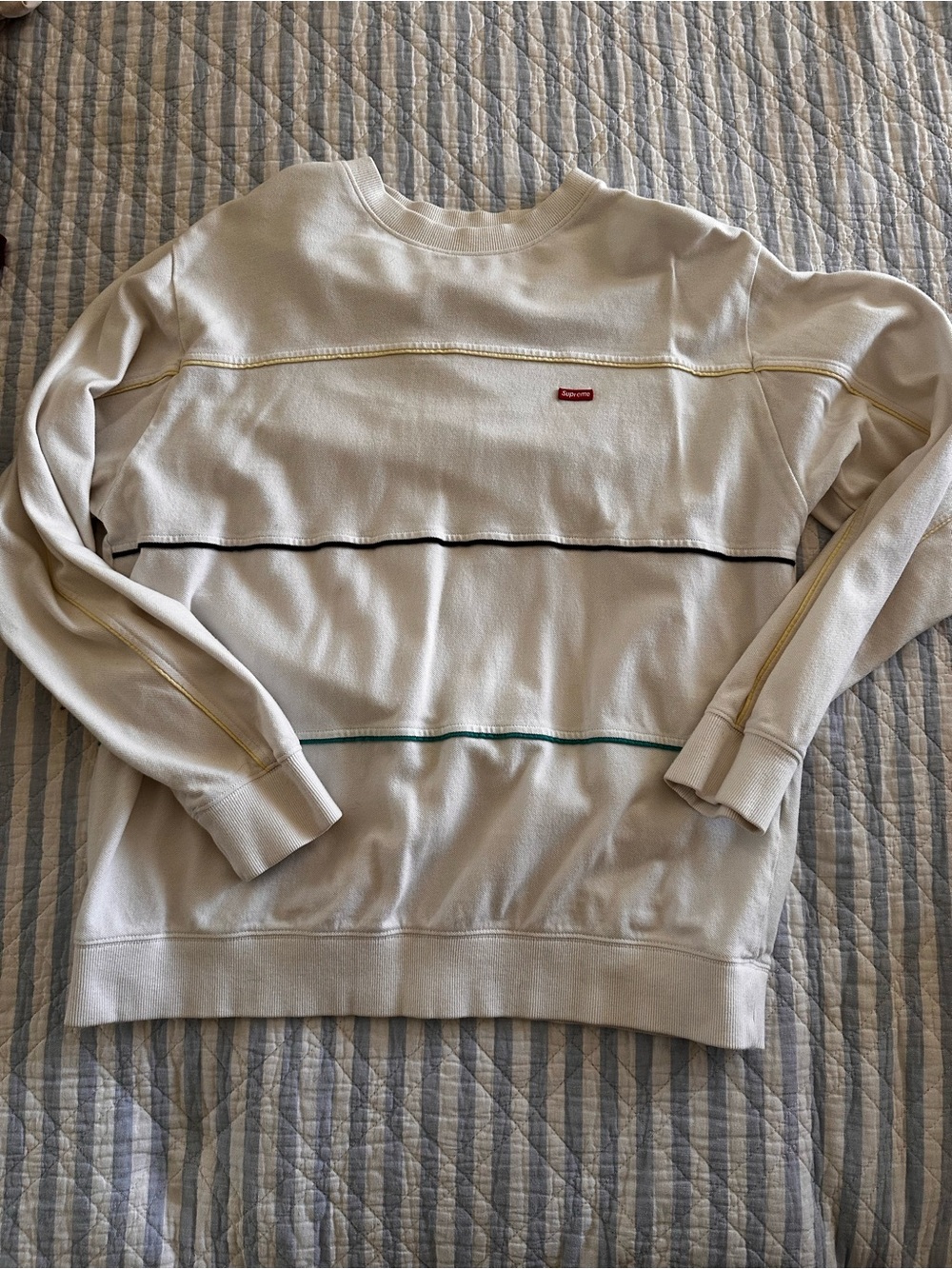 Supreme Cream Crewneck Sweater with Yellow, Black, and Teal Stripe Accents